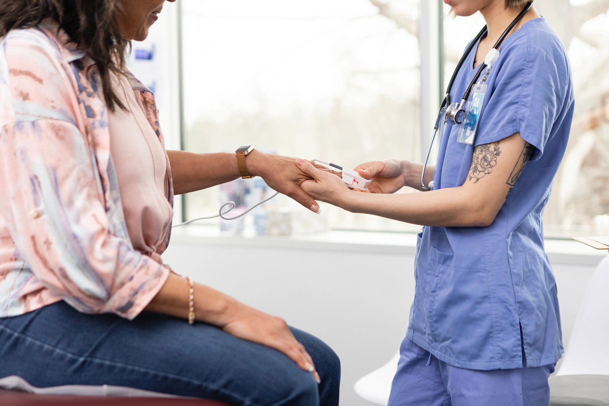 Client receiving attentive wellness care during treatment